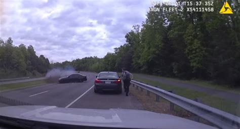 Video shows Virginia officer evade crash during traffic stop